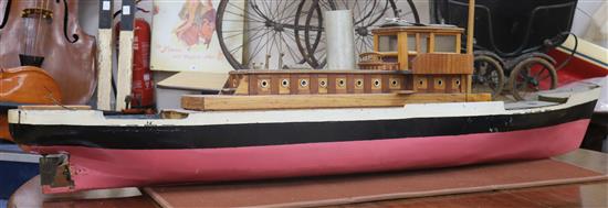 A model of a steam boat with glazed wheel house Length 168cm